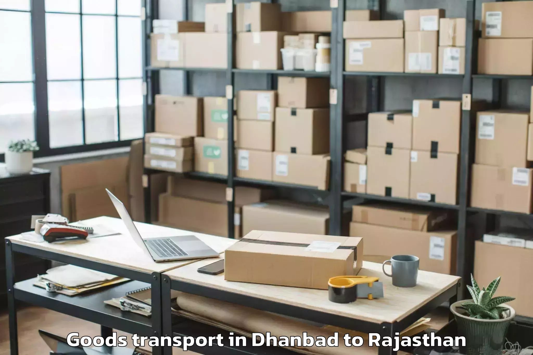 Easy Dhanbad to Jaisalmer Airport Jsa Goods Transport Booking